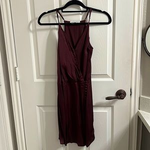 Burgundy satin cross front dress with side buttons